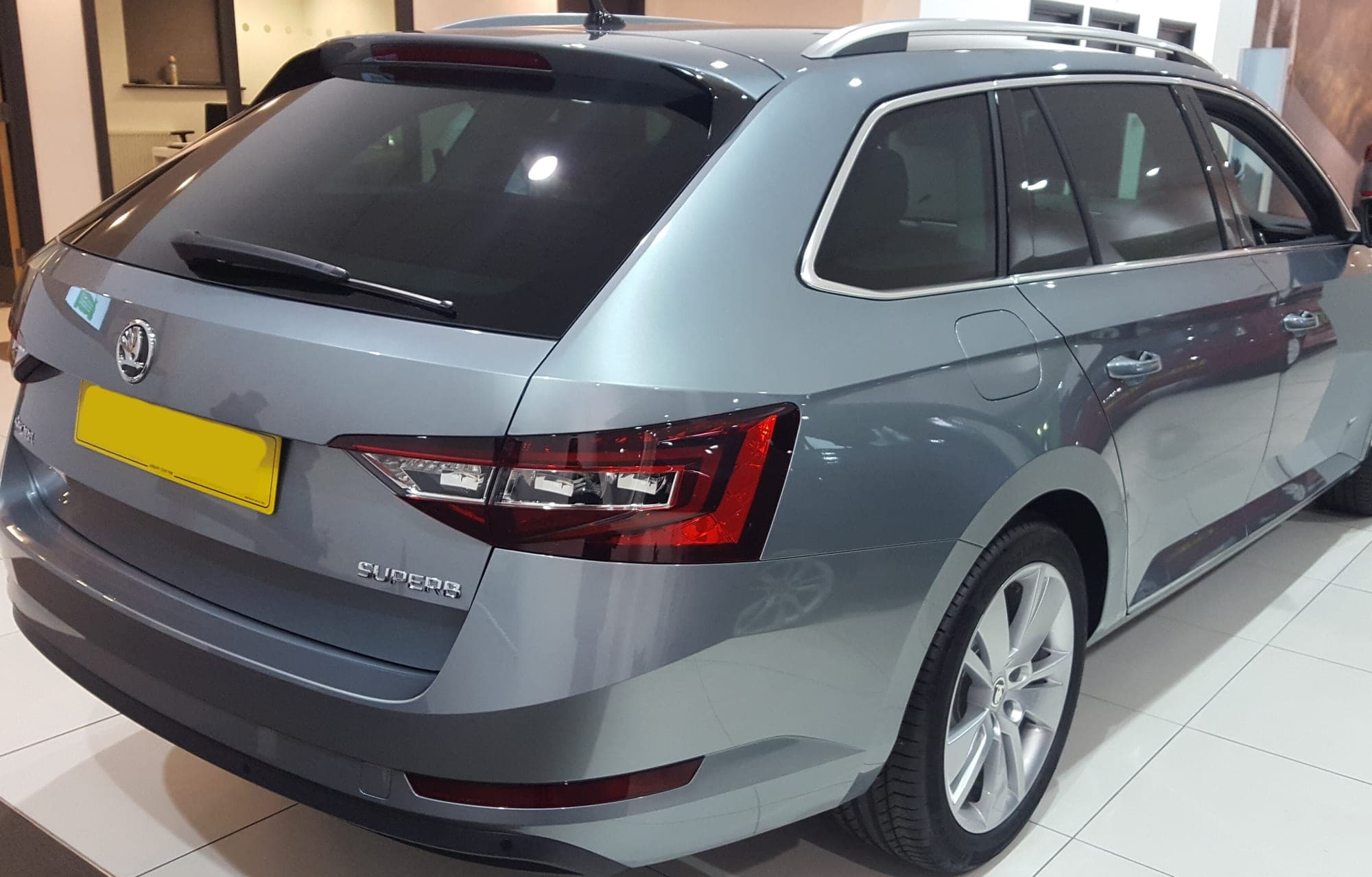 A Skoda Superb estate, showing the large boot used for airport journeys with full luggage.